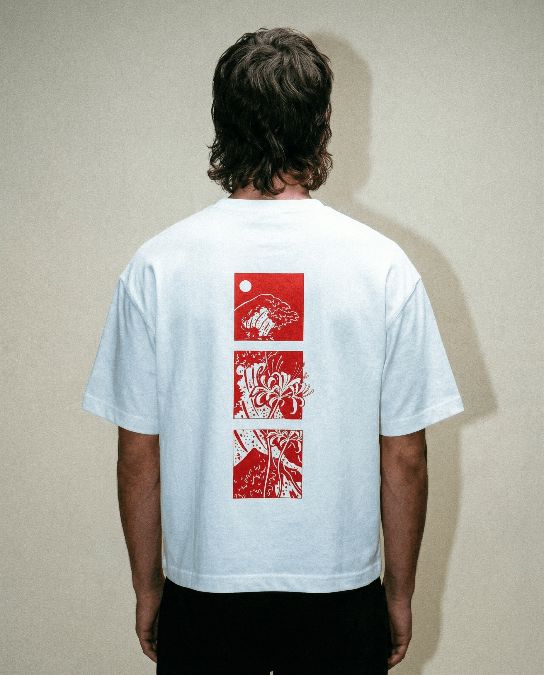 Spider Lily - White Cropped Oversized Tee with back graphic design in red on a white background.